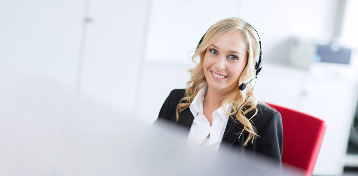 Mitarbeiter Business Foto einer Frau mit Headset